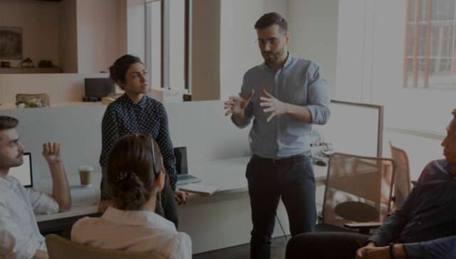 HR-Onboarding-Meeting-Business-People-Discussing-Personal-Interests